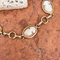 Estate/ vintage 14KT yellow gold oval, shell, carved cameo chain link bracelet. Amazing, carved design on each cameo. Size 7.5” Weight: 9.33 grams Band width: 13.5mm at widest Hallmarked Van Dell and stamped 14K Excellent estate Elegant Oval Cameo Jewelry, Classic Gold Cameo Jewelry, Classic Oval Cameo Jewelry, Elegant Gold Bracelet With Oval Cabochon, Elegant Gold Oval Cabochon Bracelet, Engraved Oval Bracelets, Oval Intaglio Jewelry For Formal Occasions, Heirloom Oval Cameo Jewelry, Elegant Gold Cameo Bracelets