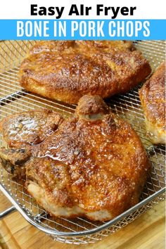 easy air fryer bone in pork chops on a wire rack with text overlay