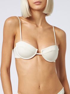 Dive into comfort and style with our Salina underwired bralette top. This elegant swimwear piece features a plain cream color, perfect for a classic yet striking beach look. Designed with adjustable shoulder straps, it ensures a personalized fit for maximum comfort and support. Composition: 90% poliammide 10% elastan Spring Swimwear With Padded Cups And Spaghetti Straps, Spring Swimwear With Spaghetti Straps And Padded Cups, Chic Solid Color Underwire Swimwear, Modern Swimwear With Adjustable Straps For Summer, Modern Swimwear With Built-in Bra For Beach, Chic Swimwear With Adjustable Straps And Underwire, Modern Beach Swimwear With Adjustable Straps, Chic Underwire Swimwear With Adjustable Straps, Chic Bra With Removable Pads For Summer