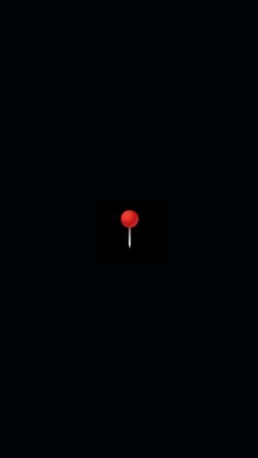 a red button on a black background