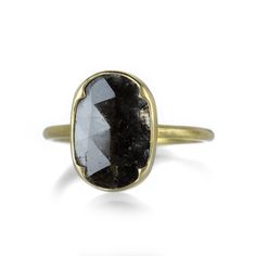 Perfect for alternative engagement, this 18k yellow gold ring from Gabriella Kiss stars an oval 1.51ct black lacy diamond, set in the artist’s signature four scalloped bezel. Minimalist in form yet intricately detailed with featherlike inclusions, this one of a kind diamond lays exceptionally flat and low. Stone measures 1/2" x 3/8", including the bezel. Size 7. Handcrafted in Hudson Valley, NY, U.S. Gabriella Kiss, Hudson Valley Ny, Black Diamond Ring Engagement, Bezel Ring, Black Diamond Ring, 18k Yellow Gold Ring, Diamond Set, Yellow Gold Ring, Hudson Valley