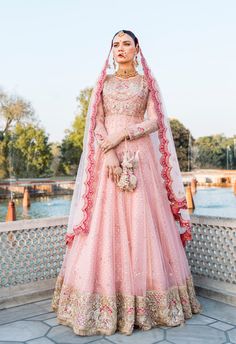 Pink Pakistani Bridal Dress in Frock Lehenga Style is an elegant attire adorned with Hand-crafted embellishments. This Lehenga Dress is available Online. Pink Pakistani Bridal Dress, Frock Pakistani, Bridal Frock, Powder Pink Color, Chic Prom Dresses, Lehenga Dress, Nails Tattoo, Pakistani Bridal Dress, Beautiful Lehenga