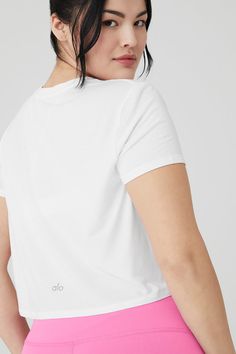 The Cropped All Day Short Sleeve is the ultimate everyday, throw-on-and-go crew neck tee. It’s made from super-soft, lightweight modal jersey fabric and hits right at the waist — perfect for creating effortless and endless outfits with any Alo bottom. Wear it solo or layered under a light cover up and get going. Super-soft modal jersey fabric Pairs perfectly with go-to high-waist bottoms Designed & uniquely fit to flatter every size Wear-tested by our in-house team for the perfect fit Sporty Scoop Neck T-shirt For Everyday, Basic Relaxed Fit Top With Ribbed Waistband, Casual Alo Yoga Tops For Loungewear, Alo Yoga Casual Loungewear Top, Alo Yoga Relaxed Fit Cotton Top, Versatile White T-shirt For Everyday, Versatile White Everyday T-shirt, Stretch Cropped T-shirt For Everyday, Basic Crew Neck Top With Ribbed Waistband