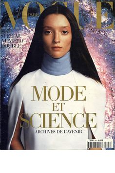 a magazine cover with a woman wearing a white top and blue skirt on the front