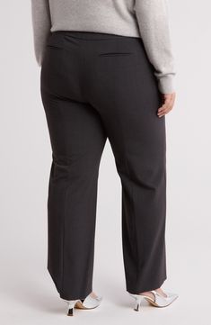 Designed with a modern slim fit and versatile solid hue, these flat-front pants are sure to keep you looking sharp. Zip fly with hook-and-bar closure 63% polyester, 32% rayon, 5% spandex Dry clean Imported Gray Flat Front Business Casual Bottoms, Gray Flat Front Bottoms For Business Casual, Calvin Klein Wide Leg Bottoms For Business Casual, Calvin Klein Wide Leg Business Casual Bottoms, Calvin Klein Wide Leg Business Casual Pants, Calvin Klein Formal Bottoms For Fall, Classic Calvin Klein Bottoms For Fall, Gray Flat Front Pants For Business Casual, Calvin Klein Wide Leg Bottoms For Fall