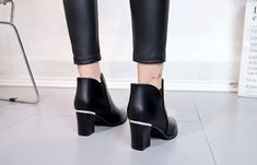 Department Name:Adult Item Type:Boots With Platforms:Yes Outsole Material:Rubber Closure Type:Slip-On Insole Material:PU Platform Height:0-3cm Toe Shape:Pointed Toe is_handmade:Yes Season:Winter Heel Type:Square heel Boot Type:Chelsea Boots Heel Height:High (5cm-8cm) Fashion Element:Rivet Fit:Fits true to size, take your normal size Model Number:OL-vi1 Boot Height:Ankle Pattern Type:Solid Shoe head style:Sharp head Popular element:Rivet waterproof table Casual High Heel Winter Boots, Black High Heel Martin Boots For Winter, Casual High Heel Martin Boots For Work, Black Pointed Toe Chelsea Boots For Winter, High Ankle Chelsea Boots For Winter Parties, Trendy High Heeled Chelsea Boots For Winter, Edgy Ankle-high Martin Boots For Winter, Trendy High Heel Chelsea Boots For Winter, Winter Party High Ankle Chelsea Boots