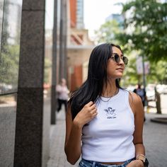 This trendy & unique Angel Energy Sorority Bella Canvas Embroidered Cropped Tank Top is sure to stand out on any campus! These tanks are perfect for big/little reveal, work-week fits, or bid day celebrations Picture Details ⭑ #1-4: White tank, Black thread (Alpha Phi) Care Instructions ⭑ Wash inside out on cold & air dry for best results ⭑ Do not dry clean ⭑ Light iron if necessary ⭑ Care instructions are included with every order. We are not responsible for damages if not cared for properly. Ta Trendy Tops With Embroidered Logo, Casual Tops With Custom Embroidery For College, Trendy Custom Embroidery Tops For Streetwear, Casual Fitted Top With Custom Embroidery, Spring Streetwear Tops With Custom Embroidery, Embroidered Text College Tops, Trendy Top With Custom Embroidery For Spring, Trendy Tops With Custom Embroidery For Spring, Work Week Outfits