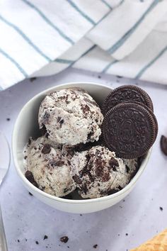 two scoops of ice cream with oreo cookies