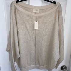 This Is Ella Mara Anthropologie Soft Knit Long Sleeve Top. Made In The Usa And New With Tags. It Is A Women’s Size Medium Although It Is Oversized So It Seems A Bit Larger. See All Measurements. Very Lightweight And Breathable. It Is Labeled As A Natural Color. Measurements: - Sleeves 21” - Length 24” - Across The Chest 26” - Bottom Him 18” Casual Oatmeal Tops For Winter, Oversized Cozy Knit Top For Spring, Beige Knit Top For Fall Loungewear, Beige One-size Tops For Fall, Cozy Beige Tops For Layering, Cozy Neutral Tops For Spring, Cozy Neutral Top For Spring, Cozy Neutral Spring Tops, Neutral Soft Knit Tops For Loungewear