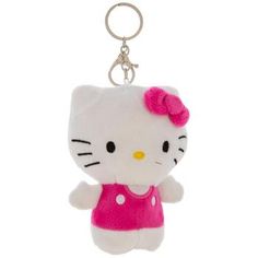 a hello kitty keychain with a pink dress on it