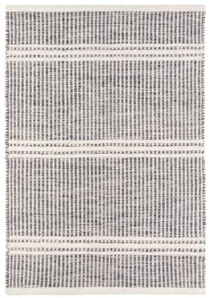 a gray and white rug with lines on the bottom, in two different colors that appear to be woven