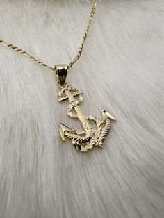 14k Solid Yellow Gold Anchor Necklace, Sea Anchor Pendant! 1 Anchor And Rope Charm, Anchor Pendant, with Gift Box Solid 14k gold, Anchor. Choose To Buy With 16in Chain Or Without Chain. Dimensions: 24.0mm x 13.0mm Diamond Cut finish for a radiant shine. Question? Please don't hesitate to contact me. *Wholesale or Custom* Wholesale: The more you buy, cheaper goes the price. Custom: Unique pieces to fit your very own style. (Different Color Gold) Contact Me for more information. Gold Nautical Anchor Necklace, Gold Anchor Necklace In Nautical Style, Gold Anchor Jewelry Gift, Gold Nautical Anchor Jewelry, Yellow Gold Nautical Anchor Jewelry, Nautical Anchor Shaped Gold Jewelry, Nautical Anchor-shaped Gold Jewelry, Nautical Anchor Gold Jewelry, Gold Anchor Jewelry For Anniversary