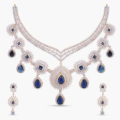 Sapphire Radiance Layered CZ Silver Necklace Set Opulent Round Necklaces For Formal Occasions, Exquisite White Gold Jeweled Necklaces, Opulent Formal Necklace With Elegant Design, Elegant Sapphire Necklace With Hand-set Details, Elegant Sterling Silver Diamond Necklace With Jewels, Elegant Sterling Silver Diamond Necklace, Formal Sapphire Necklace Fine Jewelry, Opulent Diamond Necklace With 17 Jewels, Exquisite Hand Set Pendant Necklace