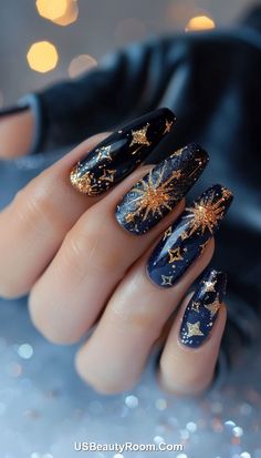 These vibrant nails showcase a dark navy blue base with dazzling fireworks-like designs in gold and silver. The intricate starburst patterns make a bold statement, perfect for celebratory occasions or to add a touch of sparkle to your everyday style. Celestial Nail Designs, Celestial Nail Art, Cosmic Nails, Celestial Magic, Galaxy Nails, Manicure Ideas, Beautiful Nail Designs, The Cosmos, The Night Sky