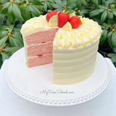 a slice is taken out of a strawberry cake