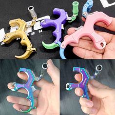 four different types of scissors being held by someone's hand with their thumbnails