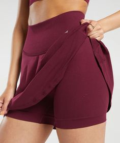 Gymshark Sweat Seamless Skort - Plum Pink | Gymshark High Stretch Cotton Activewear, High Stretch Solid Cotton Activewear, Seamless Activewear For Fall Workout, Solid Color Seamless Activewear With Relaxed Fit, Solid Color Seamless Relaxed Fit Activewear, Relaxed Fit Seamless Solid Activewear, Relaxed Fit Solid Seamless Activewear, Seamless Relaxed Fit Activewear For Workout, Solid Relaxed Fit Activewear In Recycled Polyester