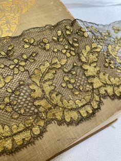 Such a pretty lace design.  Gorgeous shade of gold mixed with brown. It is in good condition. Victorian Lace For Vintage Events, Gold Lace Trim For Wedding, Gold Lace With Lace Trim For Wedding, Traditional Gold Lace With Lace Work, Vintage Lace With Lace Trim For Evening, Vintage Lace For Evening, Vintage Lace For Evening Wear, Spanish Party, Metal Lace