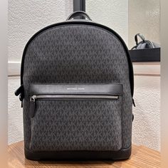 Michael Kors Hudson Logo Backpack Brand New Genuine Leather Men’s.. But In My Opinion Could Be Men’s Or Women’s Has A Padded Interior Laptop Sleeve Michael Kors Backpack, Bags Michael Kors, Backpack Brands, Michael Kors Black, Laptop Sleeve, Michael Kors Bag, Laptop Sleeves, Leather Men, Black Gray