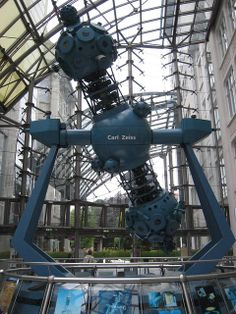 a large metal structure in the middle of a building