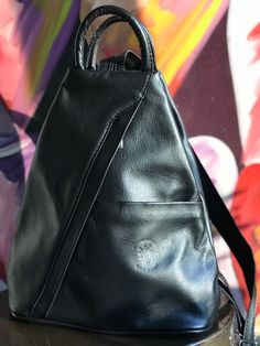 A great gift for that adventurous one!  This soft leather backpack was made in Florence Italy. Your traveler will love it!  Excellent as a carry on bag for the small essentials. Has a zipper closure plus zipper pockets inside and out. Available in gorgeous colors. #carryonbag #fashionbackpacksbags #fashionbackpack #fashionbackpackspurse #slingbag #leatherbackpack #italianleatherhandbags Carryon Bag, Soft Leather Backpack, Hands Free Bag, Small Umbrella, Italian Leather Handbags, Leather Backpack Purse, Travel Handbags, Travel Bags For Women, Genuine Leather Purse