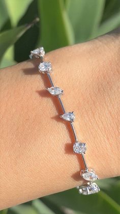 Diamond Tennis Bracelet Multi Shape Prong Set Ovals, Pears, Marquise Alternating *All specifications are for 7 Inches Specifications: -Model #: KINETICART-BR-ABJI-26854-1 -Metal Type Available: 18K, 14K White Gold, Rose Gold, Yellow Gold -Width of Bracelet: Gold Bar: 0.8 MM Including Prongs: 4.8 MM -Height of Bracelet: 3.2 MM -Gold Weight: 7 Grams -Total Diamond Weight: 6 Ovals 1.12CT 6 Marquise 0.93CT 6 Pears 0.70CT = 2.75CT -Color: F-G -Clarity: SI *18K GOLD & PLATINUM ALSO AVAILABLE WITH Luxury Oval Bracelets For Engagement, Luxury Oval Diamond Bracelet For Women, Luxury Elegant Oval Diamond Bracelet, Luxury Oval Bracelet, Luxury Modern Oval Diamond Bracelet, Luxury Oval Diamond Bracelet With Jubilee Band, Luxury Oval Tennis Bracelet With Prong Setting, Luxury Oval Diamond Bracelet, Luxury Fusion Style Oval Jewelry