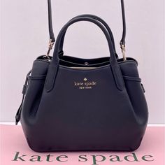 Brand New With Tag Kate Spade Dumpling Small Satchel Product Details Color: Black Measurements 9.4" W 7.9" H 5.2" D Handle Drop: 4.25" Features Strap Drop: 22" Metal Pinmount Logo Closure Type: Magnetic Snap Closure With Middle Zip Compartment Dust Bag Included: No Interior: Back Zip Pocket Exterior: Front And Back Slip Pockets Materials Pebbled Leather Lining: Two Way Spade Jacquard Lining Imported Style Number K8135 Kate Spade Black Crossbody Satchel, Kate Spade Crossbody Satchel For Evening, Kate Spade Black Satchel For Evening, Kate Spade Black Satchel With Adjustable Strap, Black Kate Spade Shoulder Bag For Evening, Kate Spade Satchel, Sunflower Daisy, Shoes For Summer, Black Leather Satchel