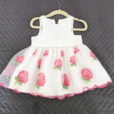 White Baby Girl Dress With Pink Stitched Detail On Edges And Flowers. Zipper Closure At The Back. Perfect For A Special Occasion. Perfect Condition Never Worn, Smoke & Pet Free Home. 9 Months Floral Applique Dress For First Birthday In Spring, Spring Floral Applique Dress For First Birthday, White Sleeveless First Birthday Dress, White Sleeveless Dress For First Birthday, White Spring Dress For Play, White Dress For Spring Plays, American Princess, Princess Dresses