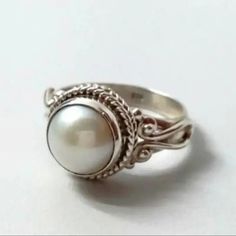 New, Excellent Quality, Unbranded Boutique Item. Brand New From Distributor No Actual Tags. Love It? Buy It! Vintage Style Ring Boutique Fashion Like Vintage Look Ring. Like Vintage Style Ring. Vintage Look Ring Faux Pearl Ring. Material 925 Silver Plated. Chic, Lightweight, And Style Ring. Supports A Women-Owned, Small Business. *More Pretty Than Photos Casual. Minimalist. Boho. Chic. Shabby Chic. Friends. Valentines. Love. Special Gift. Fashion Ring Holidays Size: 9 10 Makes A Great Gift Color Old Rings Vintage Pearl, Pearl Ring Design, Pearl Rings Vintage, White Pearl Ring, Womens Rings Fashion, Pearl And Diamond Ring, Fresh Water Pearl, Elegant Ring, Blue Nile