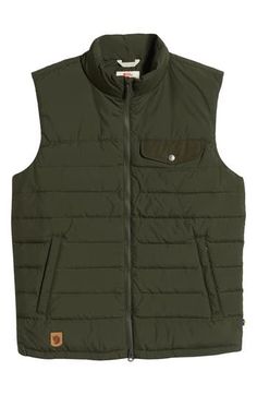 The layering possibilities are endless with this versatile down vest that offers tons of warmth and powerful protection against the elements. 26 1/2" length (size Medium) Lined, with down fill 100% polyester Machine wash, tumble dry Imported Winter Outdoor Work Vest Outerwear, Winter Vest For Outdoor Work, Functional Nylon Vest Outerwear, Sleeveless Outerwear With Fleece Lining For Hiking, Casual Nylon Vest For Outdoor Work, Sleeveless Green Nylon Outerwear, Nylon Hiking Vest For Fall, Fall Hiking Nylon Vest, Nylon Vest For Outdoor Activities In Fall