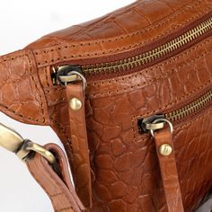 Exude refined sophistication with our Petite Croc Leather Crossbody, combining a petite size for practicality with a luxurious leather strap for that premium finish. Olive Wood Kitchen, Carbon Steel Pan, Croc Leather, Aging Beautifully, Everyday Bag, Artisan Craft, Classic Leather, Vegetable Tanned Leather, Petite Size