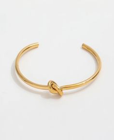 Minimalist Gold Knot Cuff Bracelet, Gold Cuff Bracelet, Gold Tie Knot Bracelet, Gold Minimalist Cuff, Gold Minimalist Bracelet, Gold Stacking Bracelet, Bridesmaid Bracelet, Bridesmaid Jewelry, Bridesmaid Gift, Ready to Ship, Tie the Knot Gift✦ 18k gold plated no tarnish water proof ✦ Size: Approximately 2.25 inches inner diameter ✦ Inner Circumference (wrist): ~6.5" inner circumference ✦ 3mm thick Adjustable Minimalist Bangle Bracelet, Minimalist Adjustable Bangle Bracelet, Adjustable Metal Bangle In Minimalist Style, Adjustable Minimalist Metal Bangle, Adjustable Dainty Cuff Bangle Bracelet, Dainty Adjustable Metal Bangle, Adjustable Bangle Bracelet With Simple Design, Simple Adjustable Bracelet Bangle, Simple Adjustable Bangle Bracelet