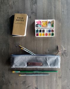 I've made this zippered pouch with artists in mind. Usually zippered pouch are not so long, but paint brushes sometimes are very long, so it is not possible to put them in a normal size pouch. This pouch is very long, you can put in it brushes long up to 31 cm! But also rulers that usually are longer than normal pouches. This case is made with waxed canvas, it is very resistant and water resistant. It has scratches on it that give to the fabric an unique vintage look that will become unique with Pouch With Zipper, Waxed Canvas Bag, Canvas Cosmetic Bag, Cute Canvas, Zippered Pouch, Waxed Canvas, Pencil Pouch, Boho Bag, Pen Case