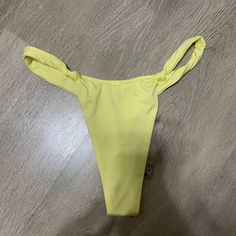 Never Worn. Pretty Yellow Color. Nothing Wrong With It, Just Not My Style Casual Yellow Nylon Swimwear, Fitted Yellow Swimwear With Drawstring, Yellow Stretch Nylon Swimwear, Yellow Seamless Beachwear Bottoms, Yellow Fitted Tie-side Swimwear Bottom, Yellow Color, Womens Swim, Swimming, Yellow