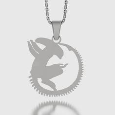 a necklace with a silhouette of a bird on it