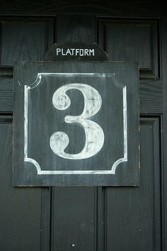 a black door with a sign that says platform 3