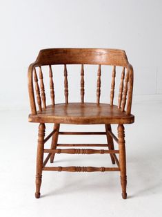 an old wooden chair on a white background