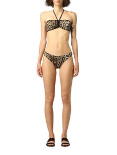 Leopard-print bikini set from ROBERTO CAVALLI featuring a bandeau top, hipster bottoms, caramel brown, black, halterneck, leopard print, and sleeveless. Be mindful to try on swimwear over your own garments. Leopard print Polyester, Elastane Clasp closure Bandeau halterneck top/ Hipster bikini bottom Light brown, black Gold hardware and clasp with logo Imported Size Bust (in) Waist (in) Hip (in) XS 32.75 24.75 36.5 M 35.75 28 39.75 Brown Strapless Beachwear Swimwear, Short Kaftan Dress, Brown Swimsuit, Bottom Light, Moschino Couture, Beach Coverup Dress, Cover Beachwear, Swimwear Sets, Beach Wear Dresses