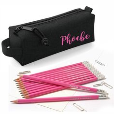 "Personalised Black Block Style Pencil Case printed with with 12 HB Pencils with Erasers. Our pencils are made to a high standard in Germany and printed in the UK. This set makes a great personalised gift that will delight any age for any occasion. Stylish, high quality European designed pencil case is printed in colours to match the pencils. See images for our great choice of fonts Pencil names are printed in Silver block capitals. One line of text with up to 30 characters, all pencils need to Pink Pencil Stationery For School, Pink Stationery With Pen Slots, Pink Pencil Stationery For Back To School, Black Stationery Gift For Back To School, Black Stationery For Back To School Gift, Black Pencil Stationery For Personal Use, Black Pencil Stationery For School, Educational Pink Pencil Craft Supplies, Engraved Pencils