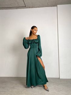 Women's wedding guest maxi dress. Emerald square neck dress with long sleeves and side slit. Floor stunning event dress with puff sleeves Material: Silk + polyester Colours: Ivory, Sky Blue, Black, Royal Blue, Emerald, White SIZE/LENGTH: XS- 128 cm (50,39'') S- 128 cm (50,39'') M-128 cm (50,39'') L-128 cm (50,39'') Model on the Foto  168cm-66,14'', S size We can customize length for you as well. PRODUCT CARE  - It is recommended to handwash 30oC. -twist carefully  Feel Free to Ask Any Question about Sizing and Fit. FREE DELIVERY WORLWIDE! Emerald Silk Dress, Wedding Guest Maxi Dress, Emerald Green Formal Dress, Green Formal Dress, Royal Blue Maxi Dress, Dress Emerald Green, Green Formal Dresses, Maxi Dress Wedding Guest, Dress With Puff Sleeves