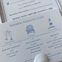 wedding stationery and menus are displayed on the table