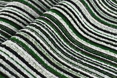 green and white striped fabric with black stripes