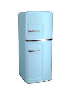 a mint green refrigerator freezer sitting on top of a white wall