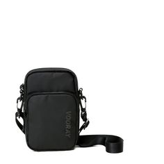 Get the Deets: 8" tall x 5" wide x 2" deep Main compartment: 5 W x 8 H Front pocket: 5 W x 6 H Main compartment holds up to 3 L. Two separate carrying compartments. Front pocket includes an elastic key/wallet clip. Removable, adjustable shoulder strap with swivel clips. Interior pockets, including phone sleeve (fits any size phone). Multiple interior elastic organizational slots for pens, lip balm and other small essentials. Matching zipper pulls & main compartment liner. Basic Black Functional Black Crossbody Phone Bag, Functional Black Phone Bag For Everyday, Black Phone Bag With Zipper Pocket For Travel, Black Rectangular Chest Bag With Cell Phone Pocket, Practical Black Chest Bag With Cell Phone Pocket, Practical Black Rectangular Chest Bag With Cell Phone Pocket, Versatile Black Phone Bag For On-the-go, Functional Black Pouch Phone Bag, Functional Black Phone Pouch Bag