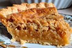 a close up of a slice of pie on a plate