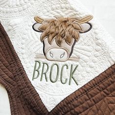 "Personalized Highland Cow Nursery Heirloom Baby Quilt, Personalized Baby Boy Shower Gift Idea, Newborn Baby Gift, Monogrammed Baby Quilt What a perfect gift  for the discriminating shopper!  This Personalized Heirloom Baby Quilt by Not A Box Creations & Design Boutique has been designed to please.  Details:   Quilt measures 36\" x 46\" Long. 100% Cotton outer fabric. Quilt is manufactured, Appliqué & personalization is added by Not A Box.  Different fabrics/threads and even a larger quilt size Highlander Cow Nursery Ideas, Highland Cow Boy Baby Shower Ideas, Highland Cow Nursery Boy, Cow Nursery Ideas, Highland Cow Quilt, Highland Cow Nursery, Embroidery Animals, Monogrammed Baby Quilt, Cow Nursery