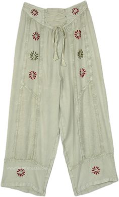 Free-flowing stonewashed straight-leg pants are perfect for any season. They impart effortless style with floral embroidery in burgundy and dark green. #tlb #SplitSkirtsPants #Stonewash #Embroidered #Misses #Pocket #Summerpants #greenpants #greenstreetpants Spring Embroidered Cotton Harem Pants, Embroidered Cotton Harem Pants For Spring, Casual Spring Embroidered Harem Pants, Casual Embroidered Harem Pants For Spring, Bohemian Harem Pants With Relaxed Fit, Bohemian Harem Pants Straight Leg Relaxed Fit, Bohemian Straight Leg Harem Pants For Spring, Casual Embroidered Wide-leg Harem Pants, Spring Embroidered Ankle-length Bottoms