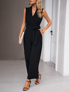 This elegant jumpsuit is stylish yet comfortable, perfect for a day of commuting. The sleeveless design coupled with the v-neck tie detailing creates a unique look that exudes sophistication and class. Look and feel your best in this beautiful one-piece; be the envy of your colleagues! Sizing: True to size Material composition: 95% Polyester, 5% Elastane/Spandex Material: Polyester Pattern: Solid Season: Four Seasons Style: Grace Weight: 600 g The new women's elegant V-neck tie commuter sleevele Elegant V-neck Jumpsuits And Rompers With Tie Waist, Chic Sleeveless Jumpsuits And Rompers With Tie Waist, Office V-neck Black Jumpsuit, Black V-neck Jumpsuit For Office, Black V-neck Jumpsuits And Rompers For Office, Sleeveless Tie Waist Jumpsuit For Date Night, Sleeveless Tie-waist Jumpsuits For Date Night, Black Sleeveless Jumpsuits For Office, Chic Sleeveless Jumpsuits For Office