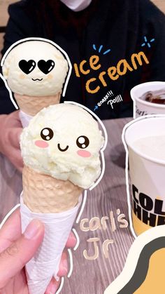 two ice cream cones with faces drawn on them