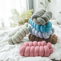 several pillows stacked on top of each other